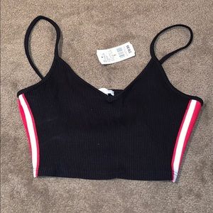 Black cropped tank with white and red stripes